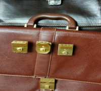 Rugar · Reparación de Carteras
